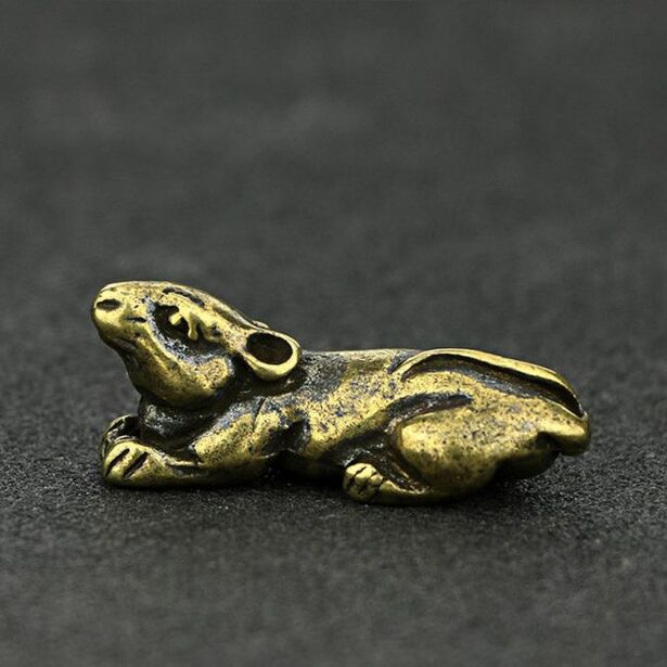 Dekorative Maus - e Symbol vu Gléck a Wuelstand
