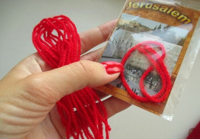roude Fuedem aus Israel als Amulett vu Gléck